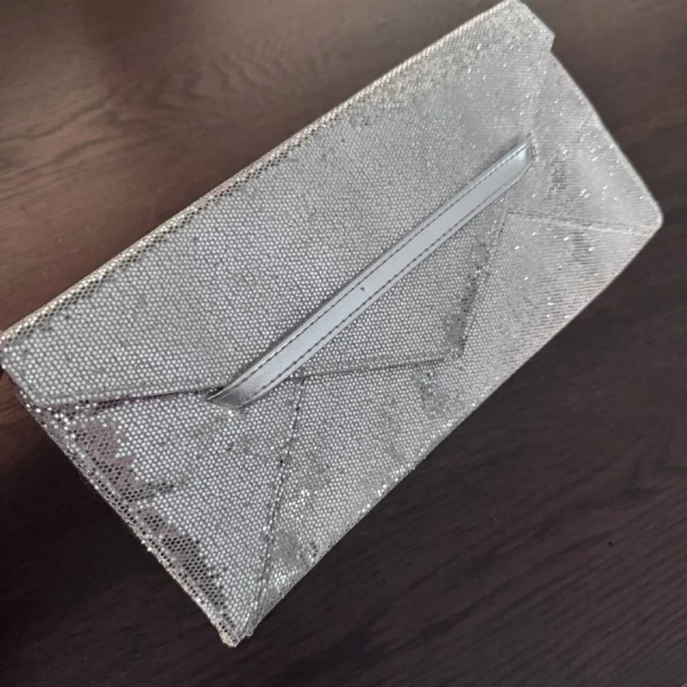 NWOT!  VICTORIA’S SECRET The Sexiest on Earth Sparkly Silver Clutch